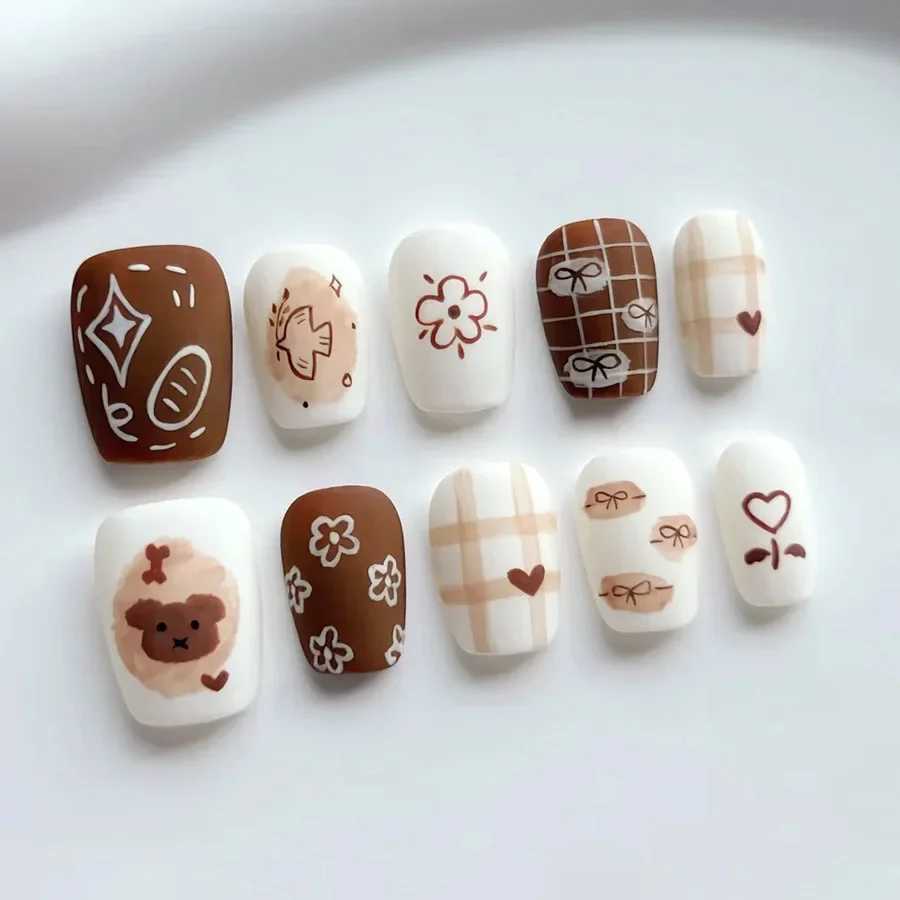 Brown cute bear fake nails with jelly stickers pressed on top of the fake nails wearable round headed oval shaped fully covered nail tips W250410