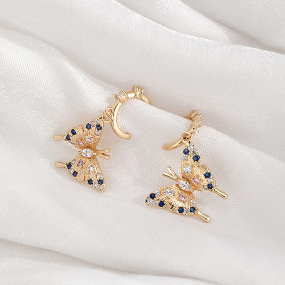 DHcollections Elegant and luxurious butterfly-shaped zirconia earrings for ladies. Fashionable, niche, high-end, with a touch of the Little Shangfeng 