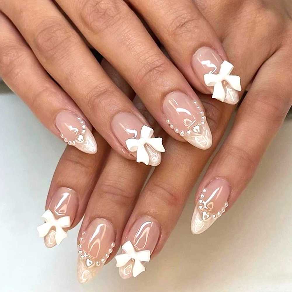24 pieces (+tools) Pearl Bow Nude Pink Pressing Nails White French Fingertips Almond Full Set Fasle Nail New Year Nail Accessories W250410