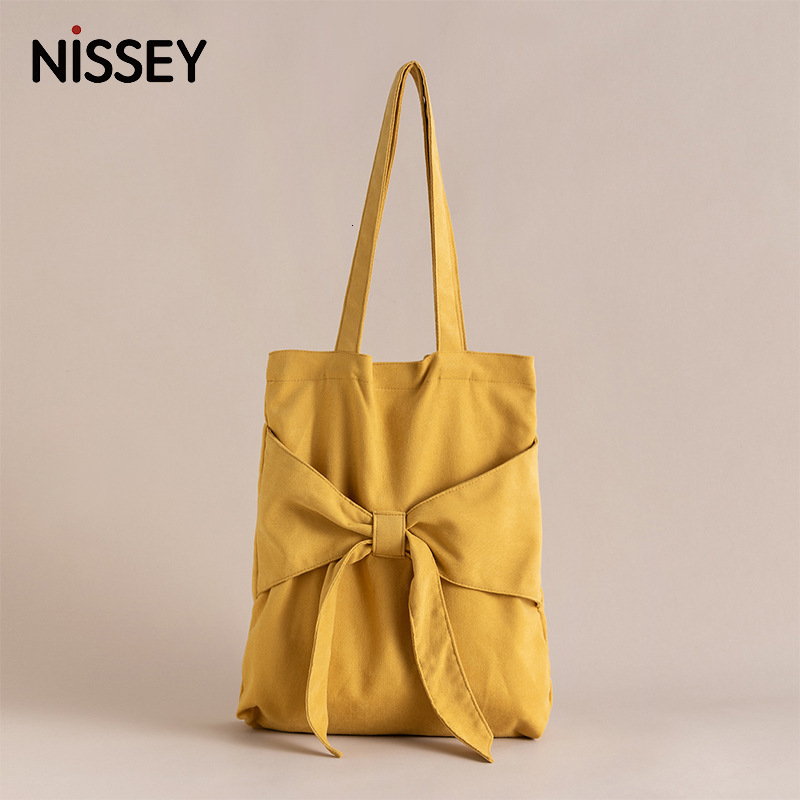 2025S New Model Designer Bag Bowtie Tote Artistic Single Shoulder Women S Student Canvas Bag Niche Design Large Capacity Handbag Totebag