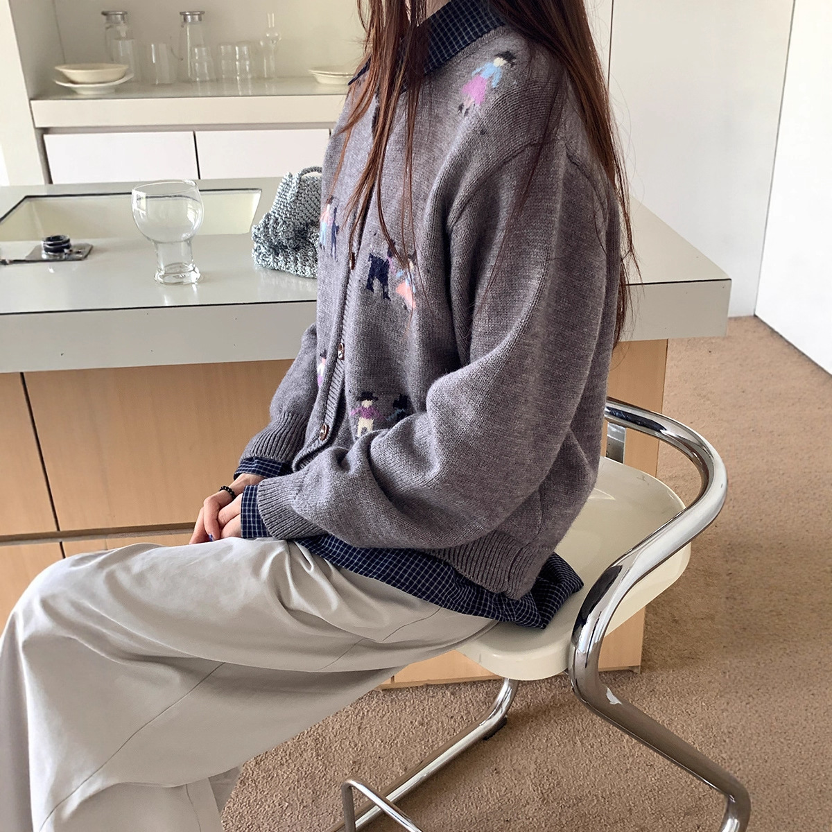 Cardigan sweater women's 2025 autumn and winter new Korean designer lazy loose slimming versatile button round neck knitted jacket