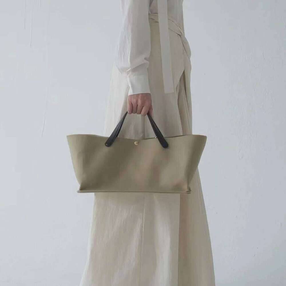 Cowhide Leather Handbag New Niche Design Large Capacity French Fashion Commuter Vegetable Basket Women's Tote Bag St251110