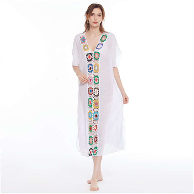New hand hook wer spliced beach cover, elongated hollow out fashionable loose sun protection long skirt, 2025 new casual fashion trend clothing