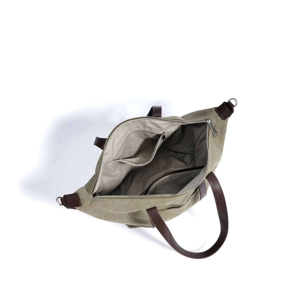 Canvas Travel Tote Bag New Niche Design Simple Casual Large Capacity Men And Women Same Fashion Hand-Laundry Shoulder Bag 251110