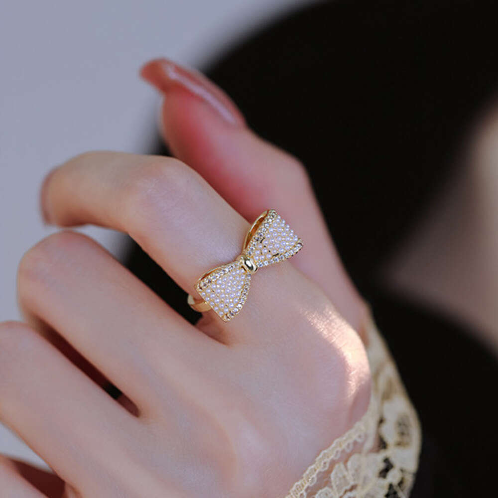 DHcollections Gentle Fairy Style Big Bow Pearl French Retro High-end Light Luxury Versatile Elegant Index Finger Ring for Women