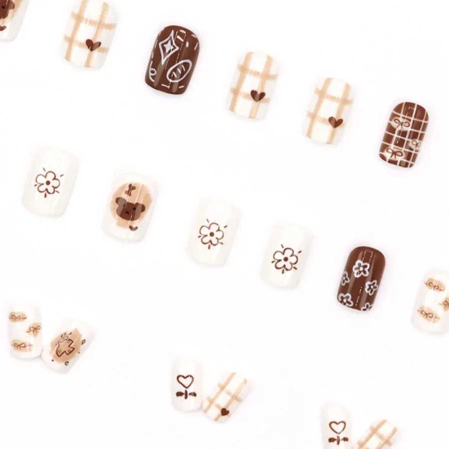 Brown cute bear fake nails with jelly stickers pressed on top of the fake nails wearable round headed oval shaped fully covered nail tips W250410