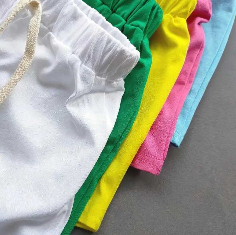 Summer girls boys shorts Korean candy color sports shorts girls cotton hot pants casual childrens beach shorts Z250410
