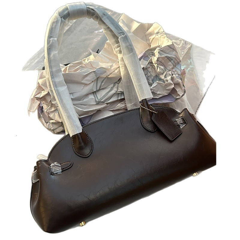 Underarm bag light luxury handbag designer bag winter new style solid color fashionable retro leather texture shell bag