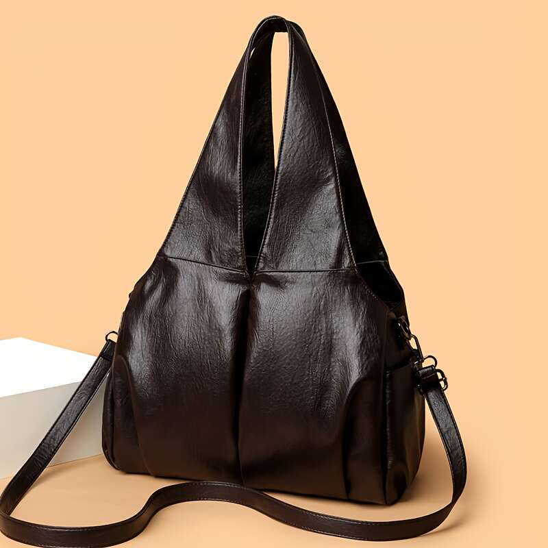 Vintage Style Women S Handbag Featuring An Elegant V Shaped Silhouette Soft Leather Offers Delicate Touch And Versatile Carrying Options That Easily