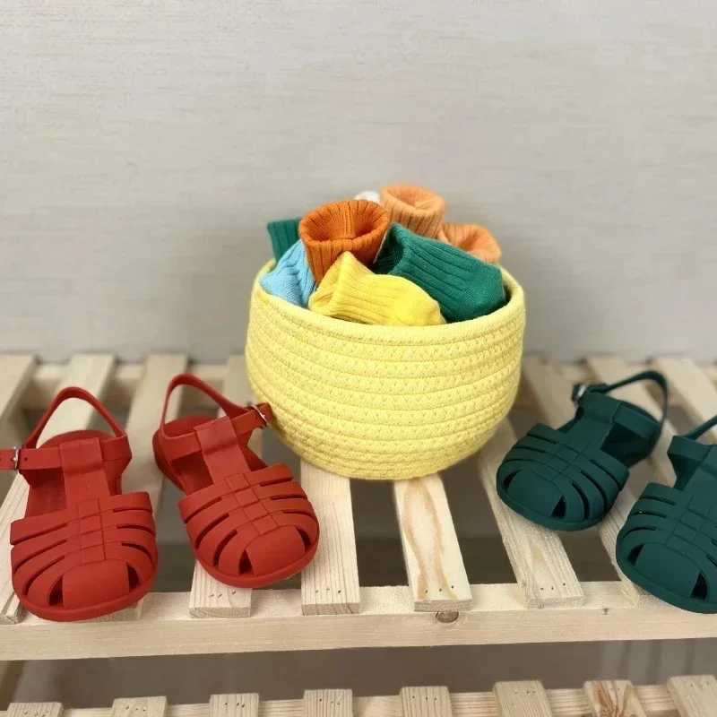 Summer baby sandals childrens Roman childrens hollow princess metal buckle shoes candy jelly beach shoes girls and boys sliders Z250410