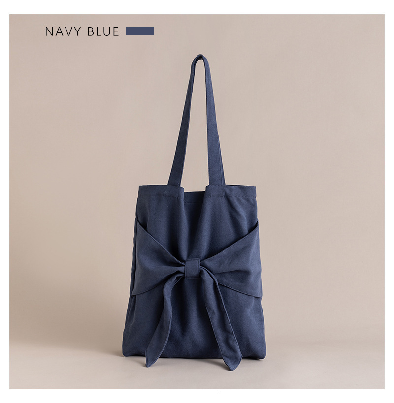 2025S New Model Designer Bag Bowtie Tote Artistic Single Shoulder Women S Student Canvas Bag Niche Design Large Capacity Handbag Totebag