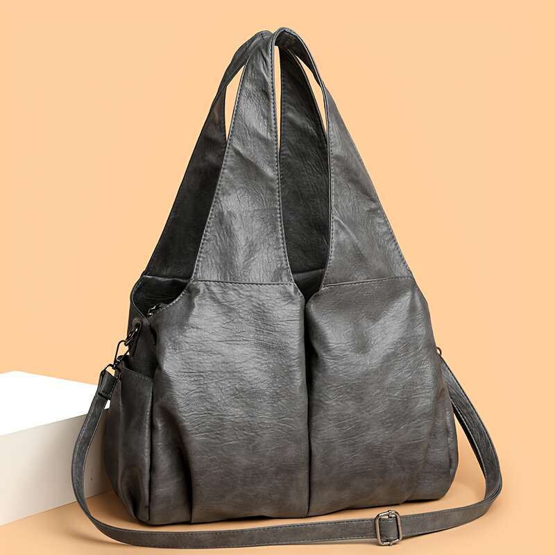 Vintage Style Women S Handbag Featuring An Elegant V Shaped Silhouette Soft Leather Offers Delicate Touch And Versatile Carrying Options That Easily