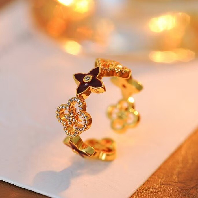 Oil Drop Full Diamond Lucky Four Leaf Fashion Ring Clover Women's Hollow Ring European And American Style Ins Designer Ring Light Luxury Elegant 