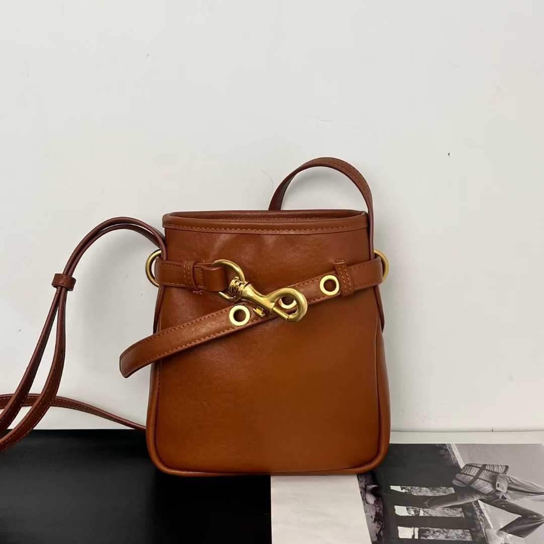Cowhide designer bag winter new fashion commuting luxury handbag mobile phone bag retro style mini women's shoulder crossbody bag