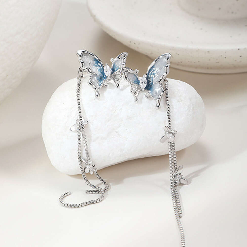 DHcollections Super Fairy Long Blue and White Oil Drop Butterfly Fashion Fresh Ins Style 925 High-end Retro Earrings for Women