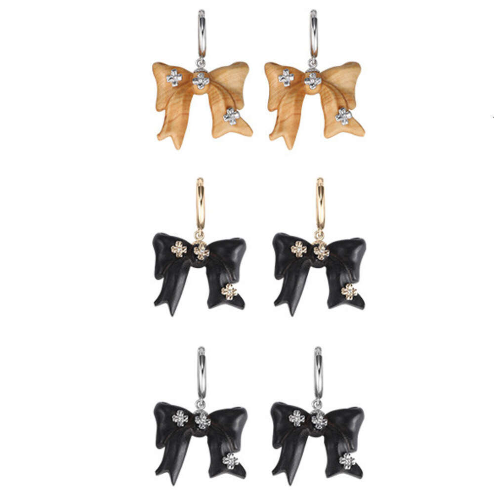 DHcollections Autumn Winter Melad Wooden Bow Earrings for Women, Light Luxury Niche Original Design, Elegant Versatile Clips and Ear Jewelry