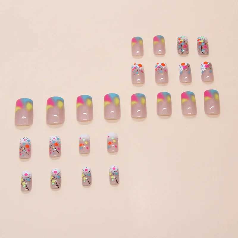 24 fake nails with watercolor stains with jelly stickers pressed on top of the fake nails wearable round headed oval shaped fully covered nail tips W2