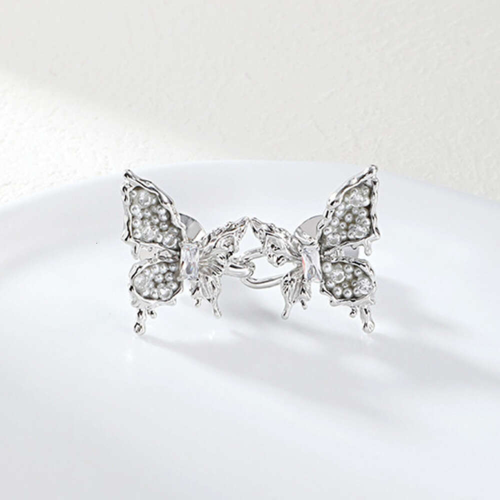 High-end Pearl Butterfly Buckle Wholesale Cool Fashion Versatile Magic Pants Waist Tightening Button
