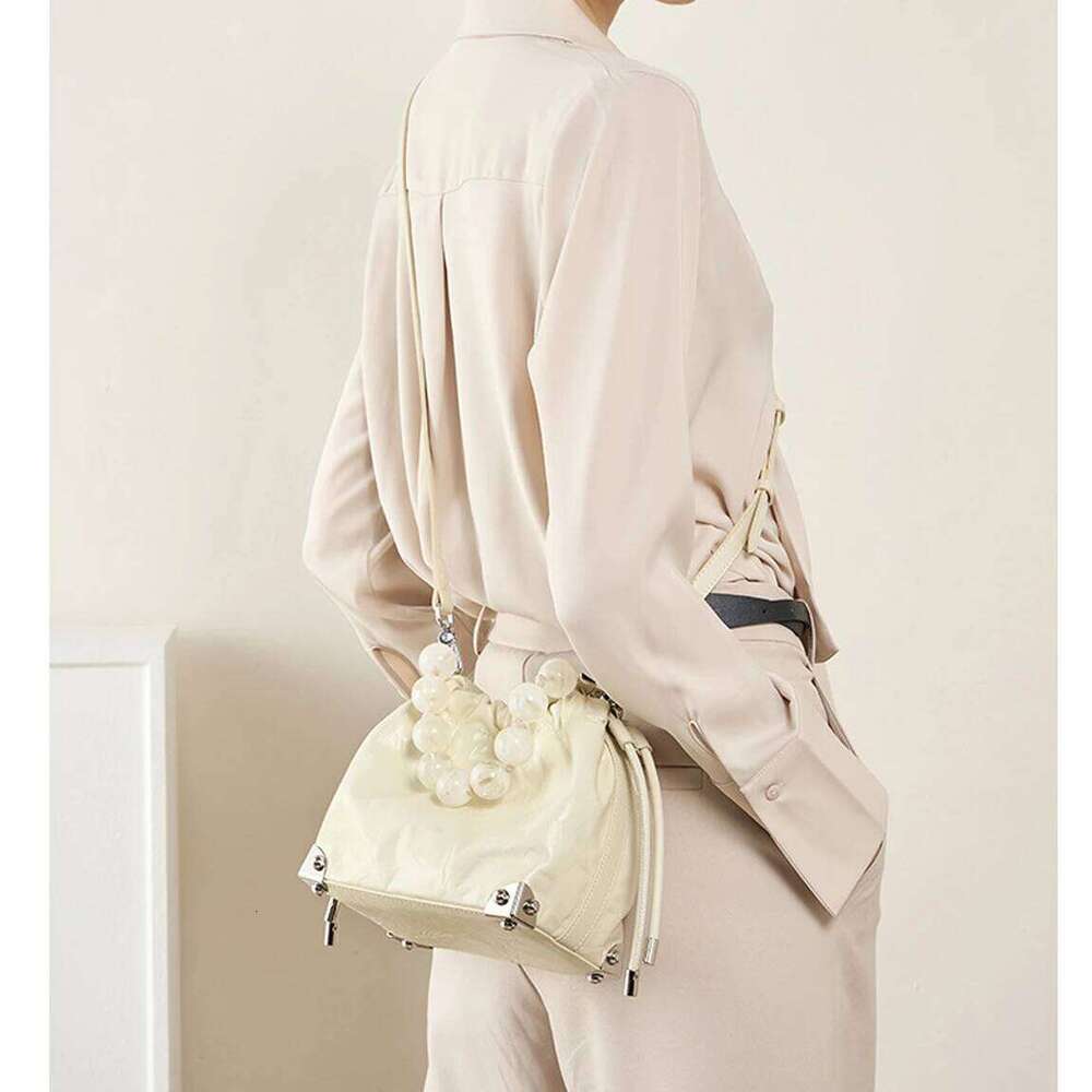 New Chinese Style Beaded Genuine Leather Handheld Wrinkled Crossbody Shoulder Bag For Women Boho Chic Clutch Purse St251110