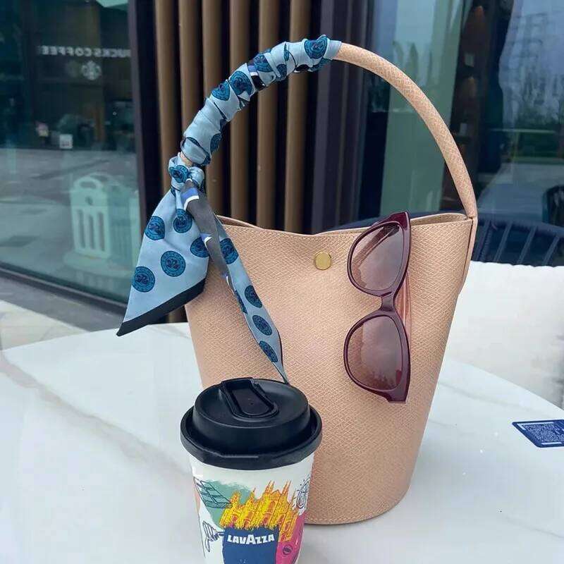 designer bag tote bag 2025 New Women's Genuine Leather Bucket Fashion Casual Mini Portable Cowhide Simple Versatile Shouder Small lightweight Bag
