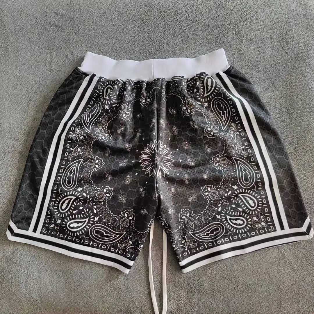 Best Los Angeles style black Paisley print basketball shorts with zippered pockets worn by Bryant Street in training pants X250410