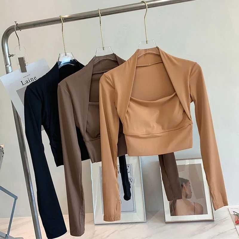 Womens long sleeved sports shirt with chest cushion quick drying running training sports top sexy slim fit sports topXJ250410