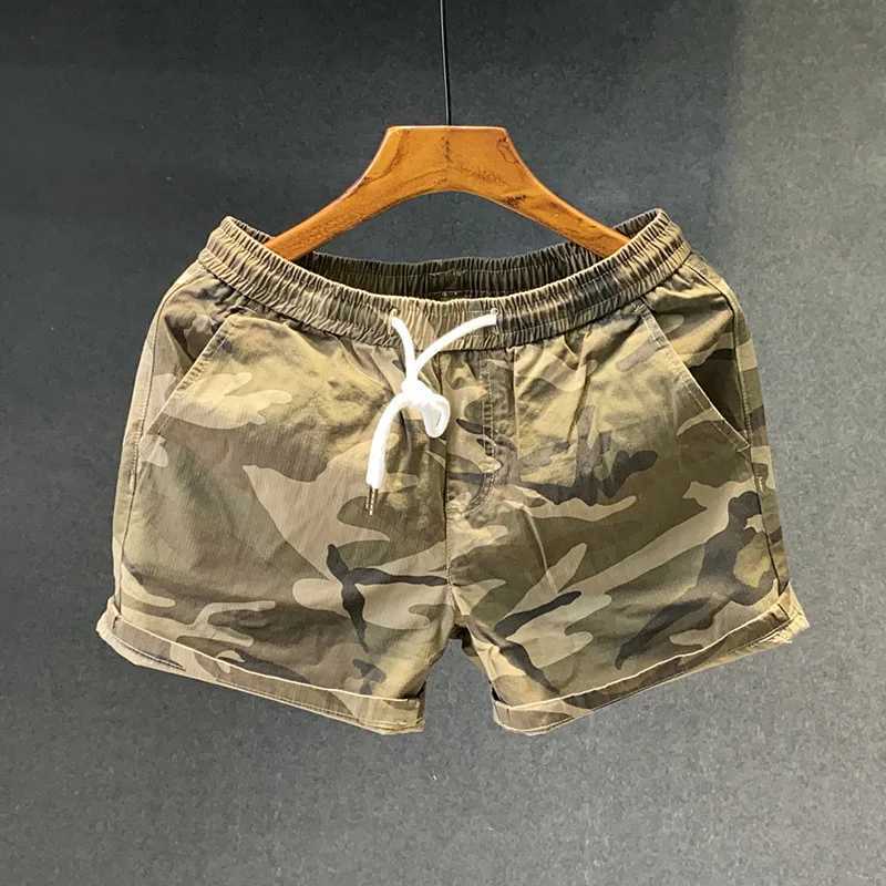 Summer casual camouflage shorts mens elastic waist mid length pants loose one-third fashionable sports beach pantsW250410