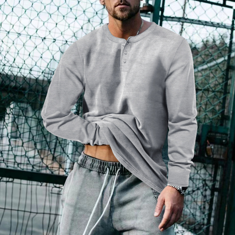 2024 mens spring and autumn round neck long sleeved T-shirt loose fitting pullover casual solid color T-shirt base shirt