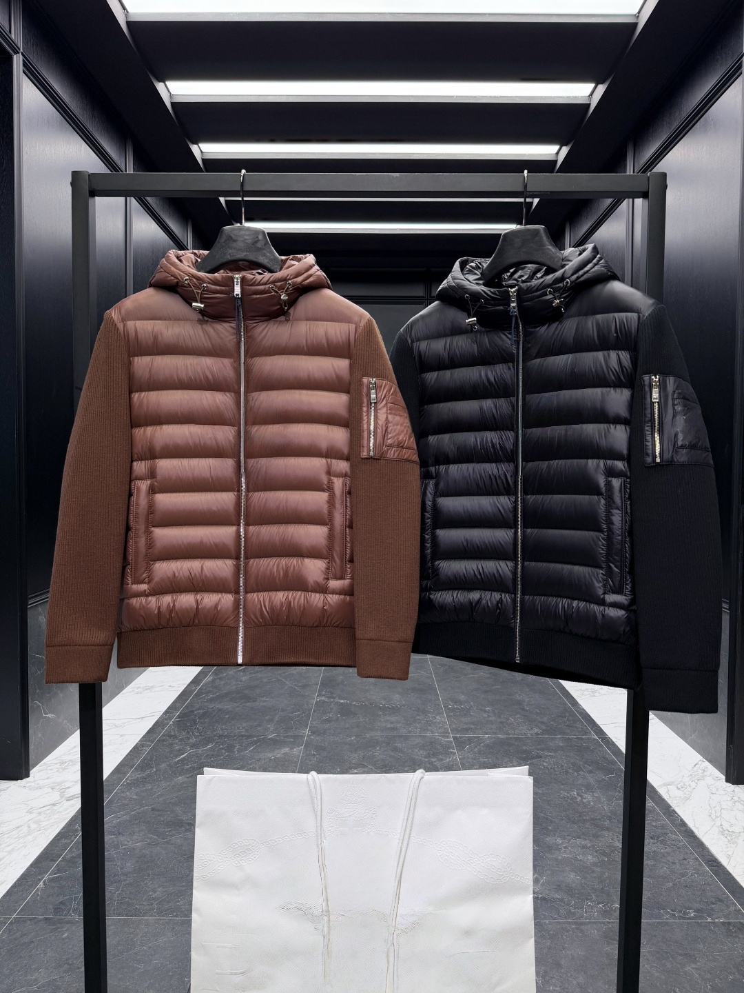 The latest knitted down jacket is windproof, warm, and offers excellent value for money. It is filled entirely with goose down.