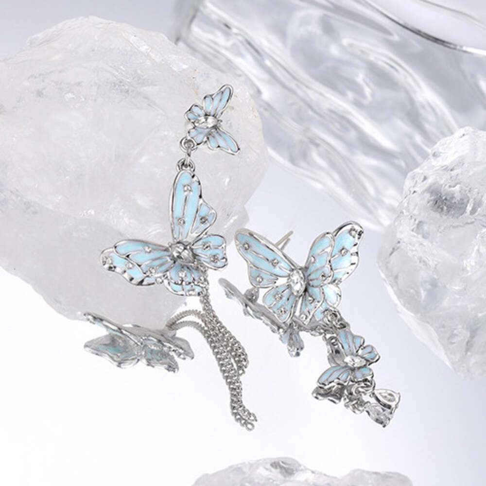 DHcollections Original Design Asymmetric Blue Butterfly for Women, Light Luxury Fashion Sweet Cool Versatile High-end 925 Silver Needle Earrings