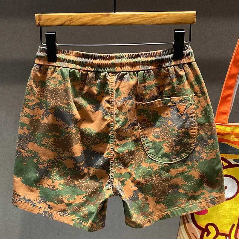 Camouflage four point casual shorts mens fashion fully matched trend loose summer slim trend brand wearing summer beach pantsW250410