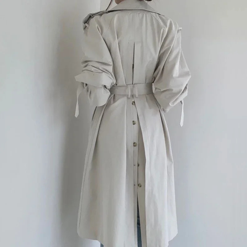 Korean womens medium length windproof machine with shoulder strap and split button n blue beige casual doublelayer long sleeved trench coat 250410