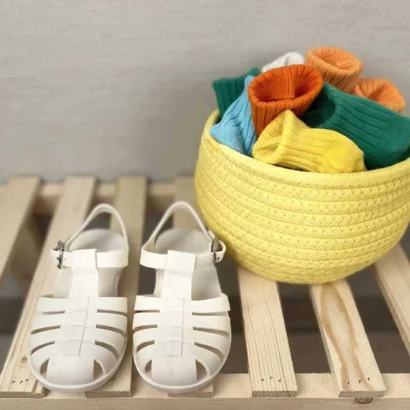 Summer baby sandals childrens Roman childrens hollow princess metal buckle shoes candy jelly beach shoes girls and boys sliders Z250410