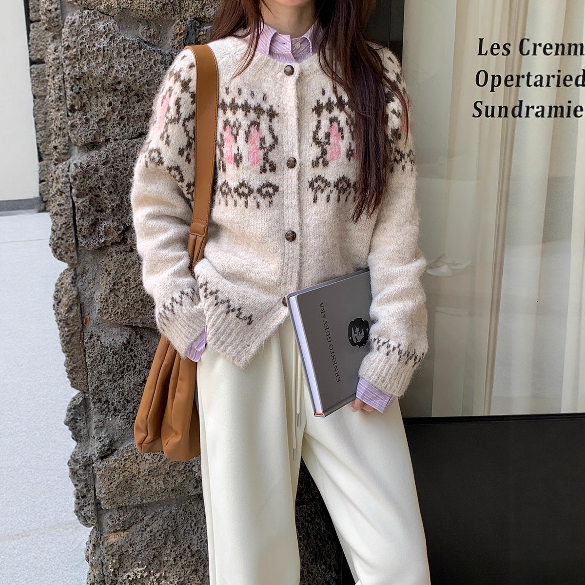 Designer sweater women's winter 2025 new Korean retro lazy loose slimming long sleeved knitted cardigan top