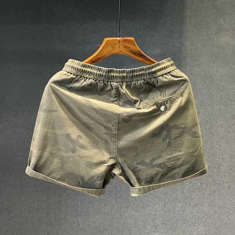 Summer casual camouflage shorts mens elastic waist mid length pants loose one-third fashionable sports beach pantsW250410