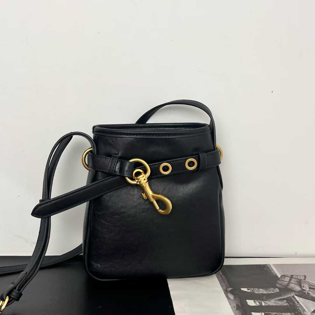 Cowhide designer bag winter new fashion commuting luxury handbag mobile phone bag retro style mini women's shoulder crossbody bag