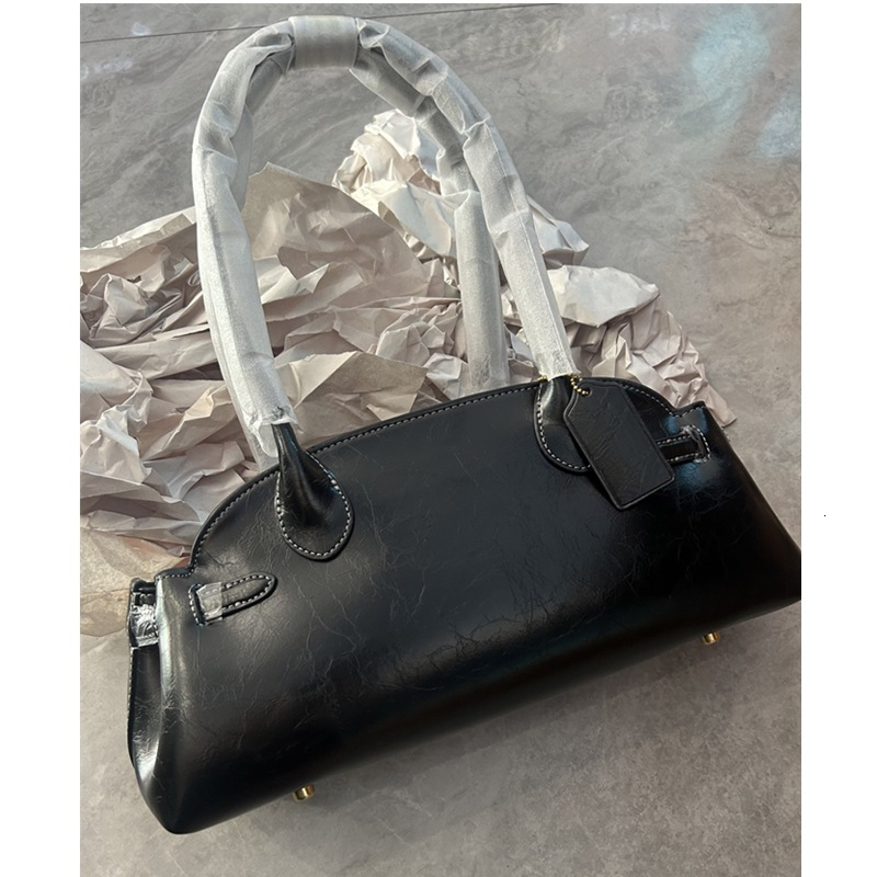 Underarm bag light luxury handbag designer bag winter new style solid color fashionable retro leather texture shell bag