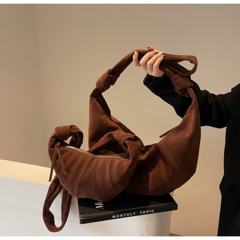 Spring Ready Women's Handbag Collection: Classic Sloped Silhouette Plus Extra Storage Space