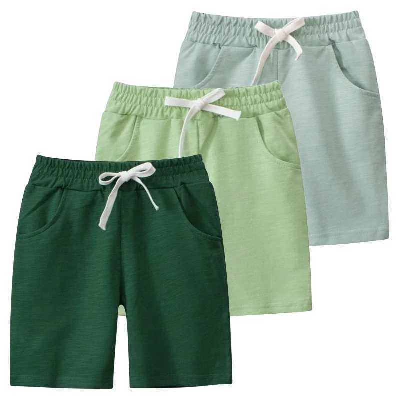 New solid color sports shorts for summer 2025 suitable for childrens clothing elastic waist shorts and cotton childrens clothing Z250410