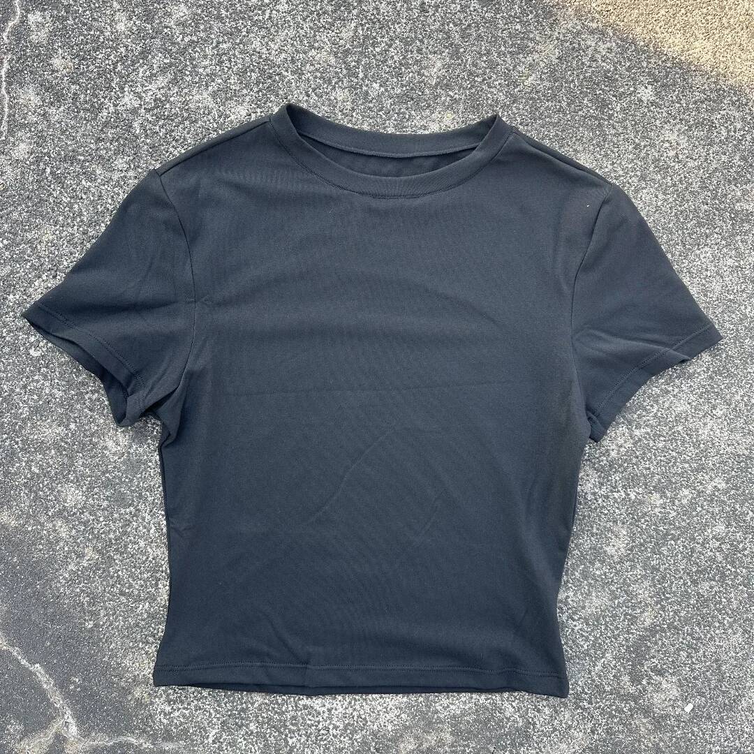 Solid color women's soft breathable yoga short-sleeved comprehensive training tight T-shirt with exposed belly button fitness sh