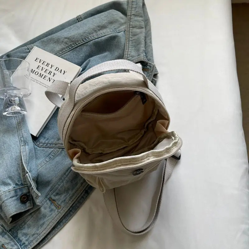 Commuting Canvas Round Cake Bag Women Niche n Handheld Pleated Fashionable Simple Crossbody Singleshoulder Zipper 251110