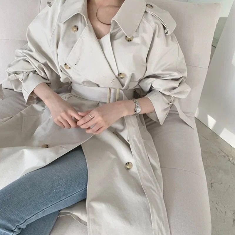 Korean womens medium length windproof machine with shoulder strap and split button n blue beige casual doublelayer long sleeved trench coat 250410