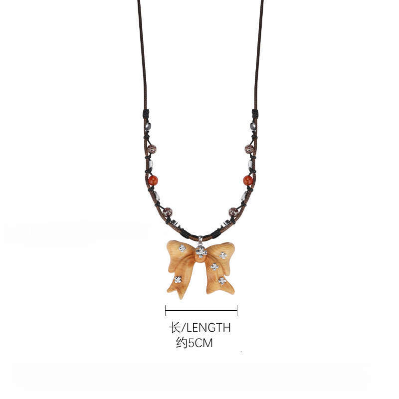 Milad Wooden Bow Pendant Necklace Women, Autumn and Winter Original Design, Light Luxury Niche High-end Sweater Chain for Women