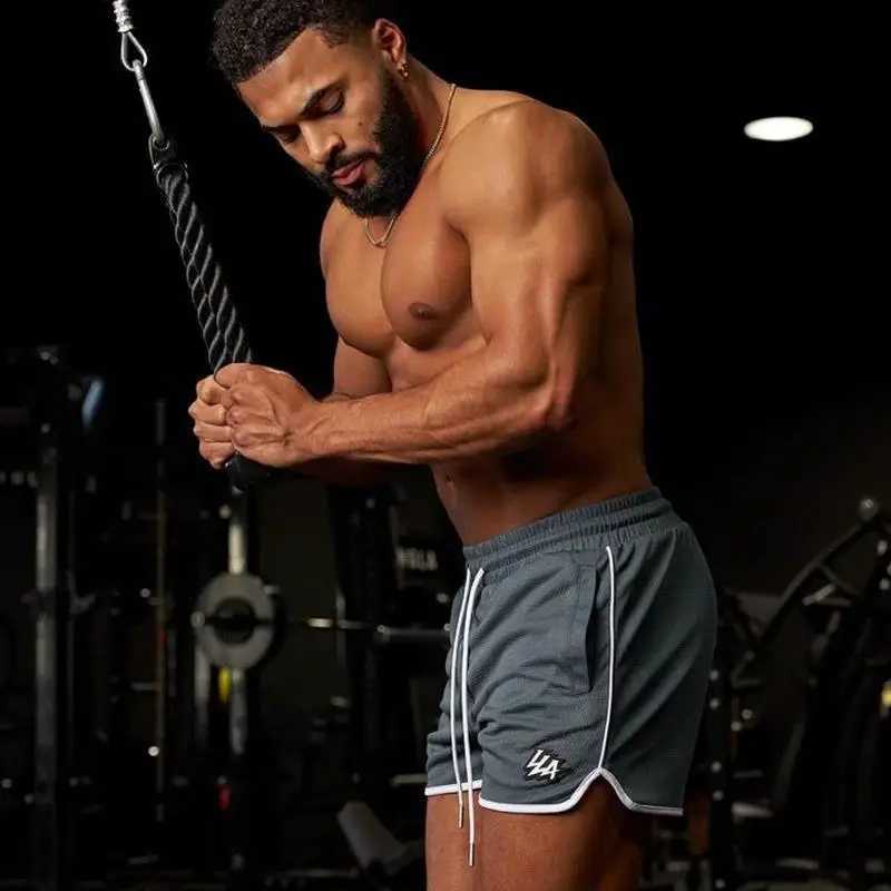 Summer 2025 mens shorts mens and womens fashionable beach casual shorts mesh sports quick drying quarter pants X250410