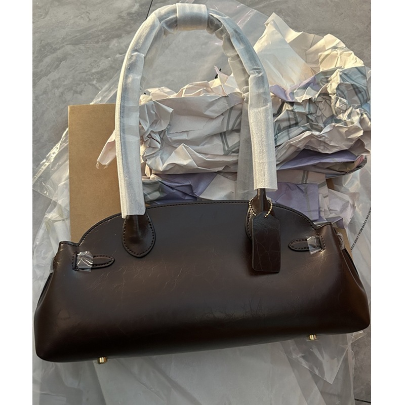 Underarm bag light luxury handbag designer bag winter new style solid color fashionable retro leather texture shell bag