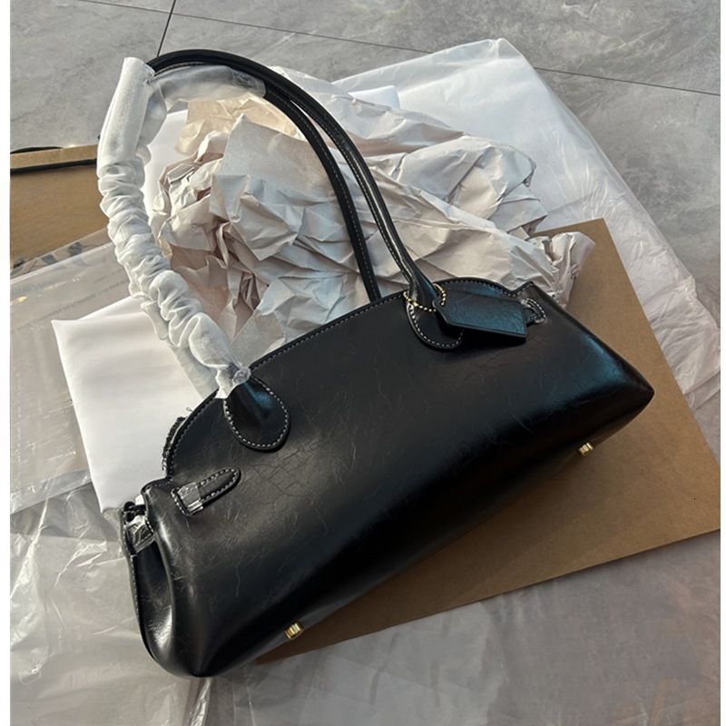 Underarm bag light luxury handbag designer bag winter new style solid color fashionable retro leather texture shell bag