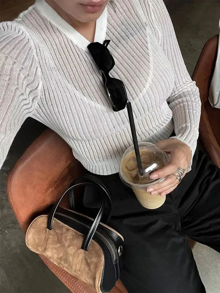 Solid long sleeved round neck ribbed knitted cut sweater 250407