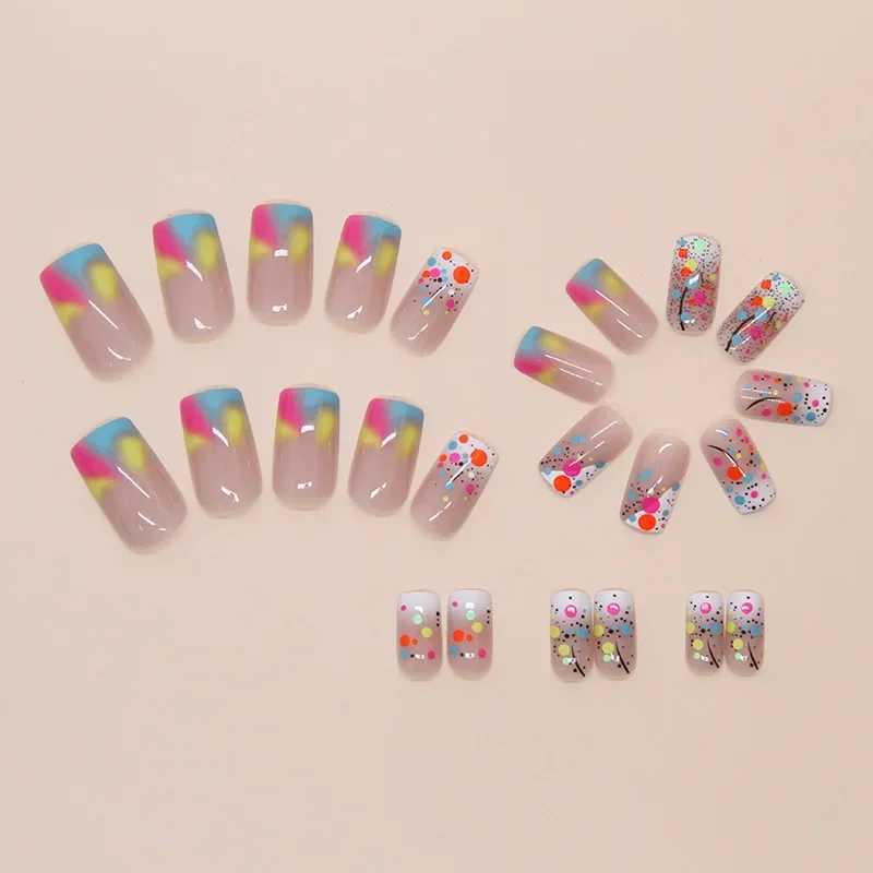 24 fake nails with watercolor stains with jelly stickers pressed on top of the fake nails wearable round headed oval shaped fully covered nail tips W2