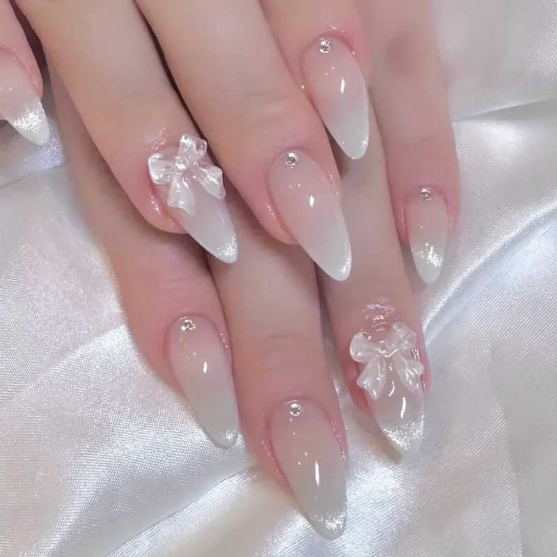 24 Sweet Cat Eye Almond French Pressing Nails with 3D Bow and Rhinestone Decoration Fully Covered with Female Fake Nails W250410