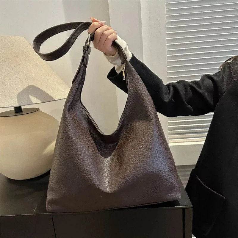 Womens soft PU leather shoulder bag large capacity fashionable clown garbage adjustable strap lower arm handbag 250401